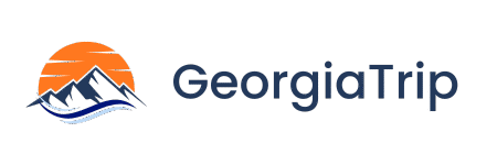 Логотип GeorgiaTrip – солнце, горы и волна